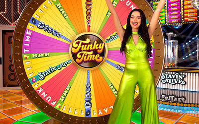 Live game show host presenting at colorful Crazy Time wheel